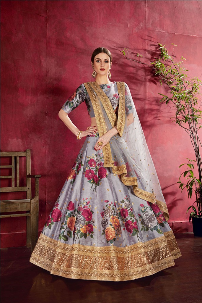 Adorn A Lovely Trendy Look This Wedding Season With This Heavy Designer Lehenga Choli